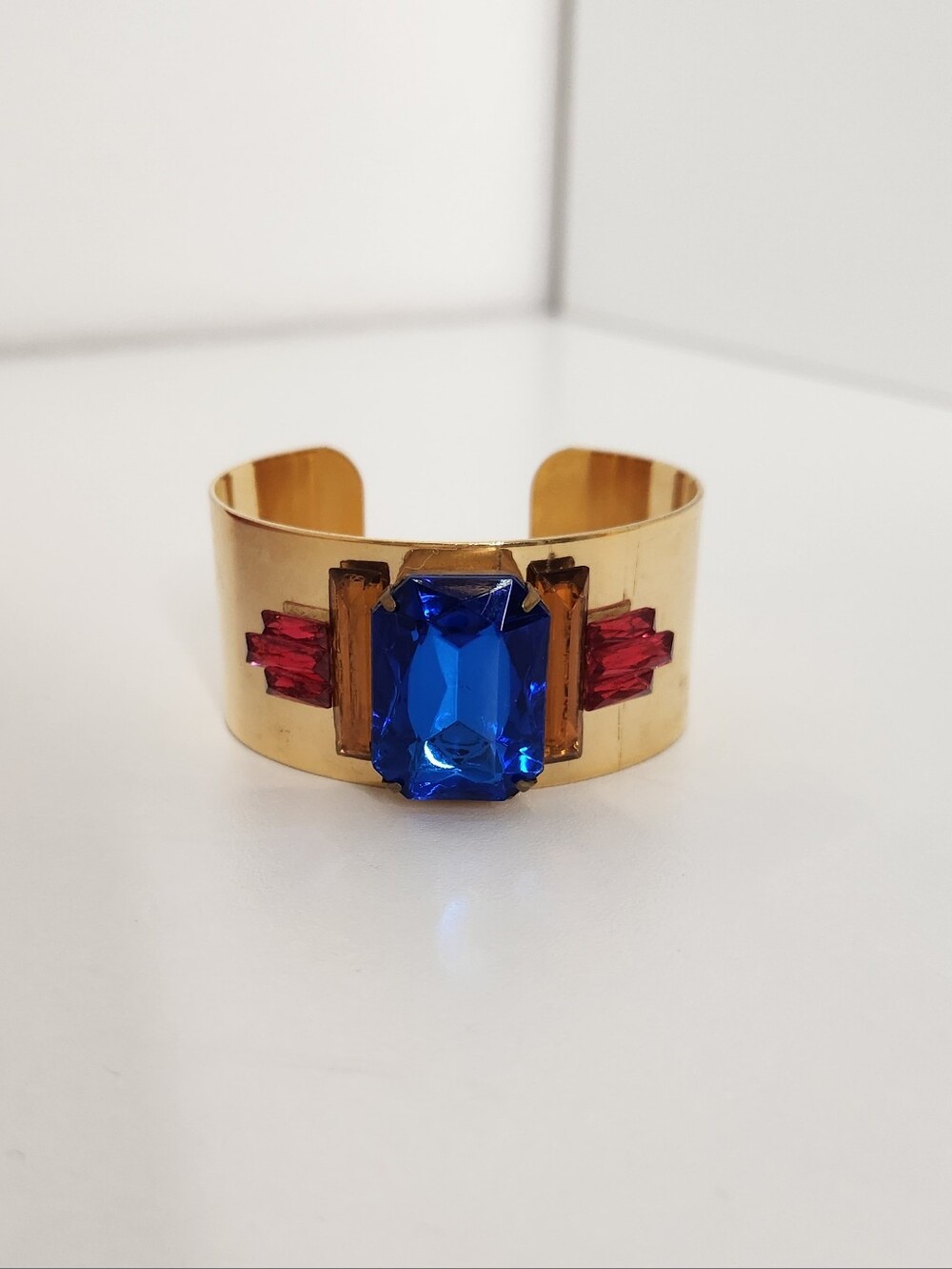 Gold Cuff Bracelet with Sapphire Blue and Ruby Red Stones